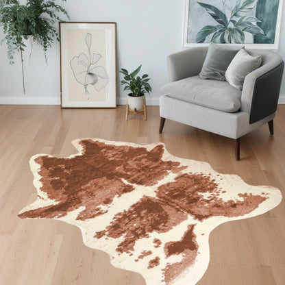 4' X 5' Brown and Ivory Faux Cowhide Animal Print Printed Area Rug