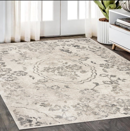 5' X 8' Grey Machine Woven Distressed Floral Medallion Indoor Area Rug