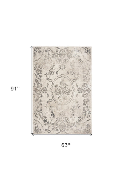 5' X 8' Grey Machine Woven Distressed Floral Medallion Indoor Area Rug