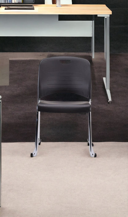 Set of Four Black and Silver Plastic Office Chair