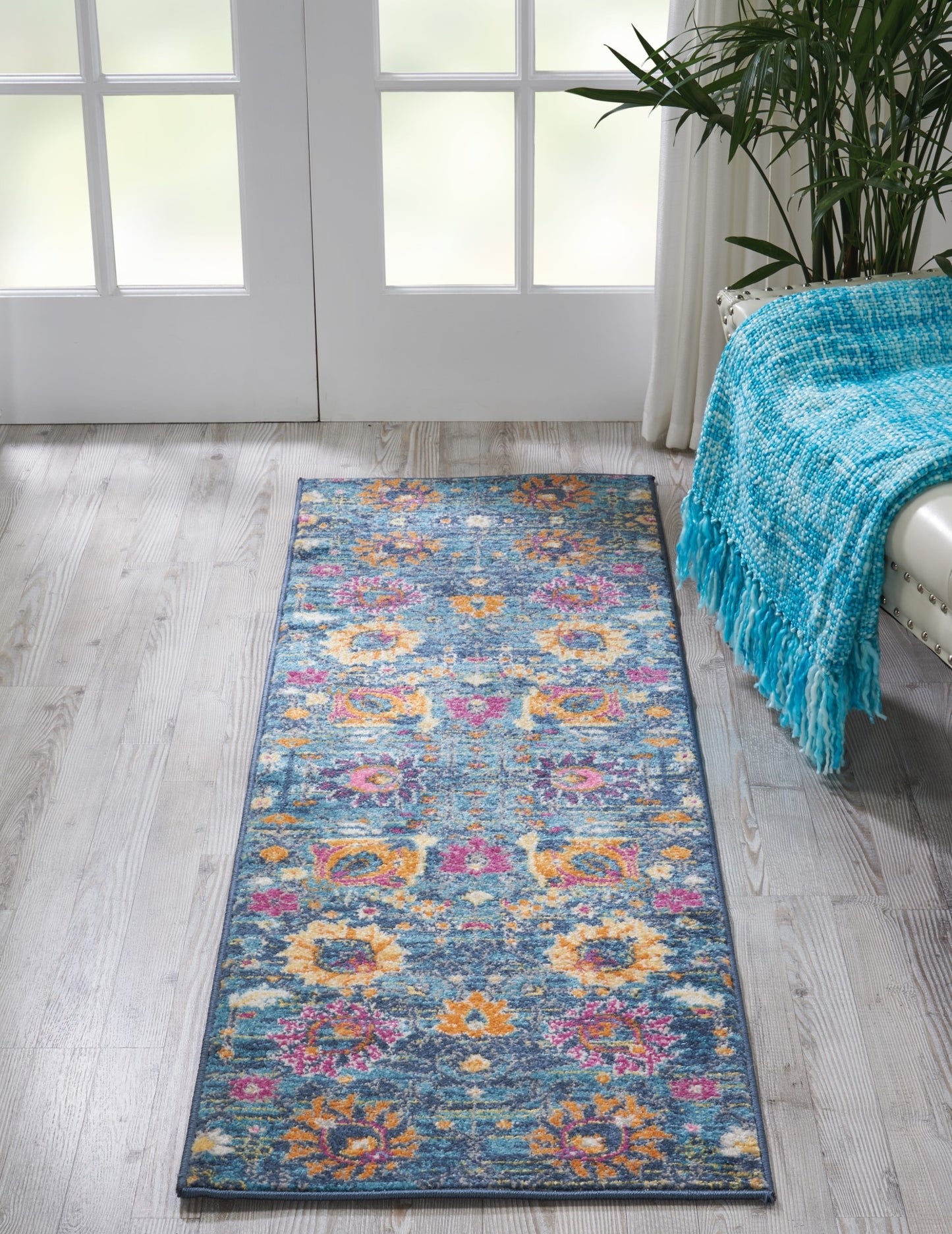 8' X 10' Blue And Orange Floral Power Loom Area Rug