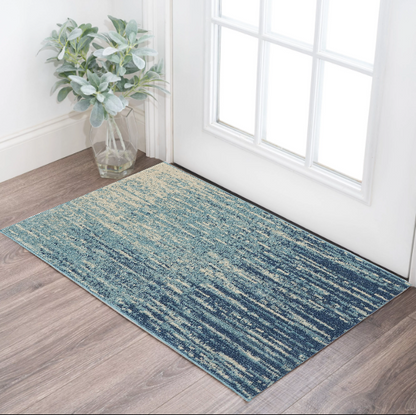 7' X 10' Blue and Ivory Abstract Stripes Power Loom Area Rug