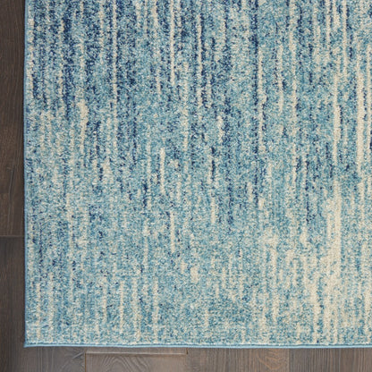 7' X 10' Blue and Ivory Abstract Stripes Power Loom Area Rug