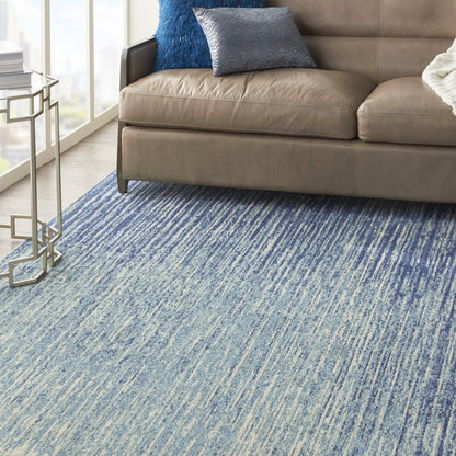 7' X 10' Blue and Ivory Abstract Stripes Power Loom Area Rug