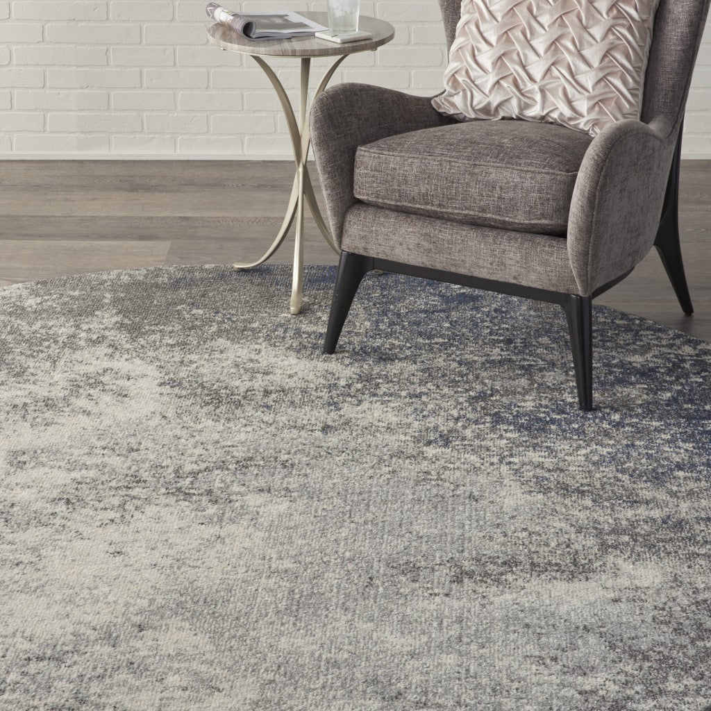 5' X 7' Gray And Ivory Abstract Power Loom Area Rug