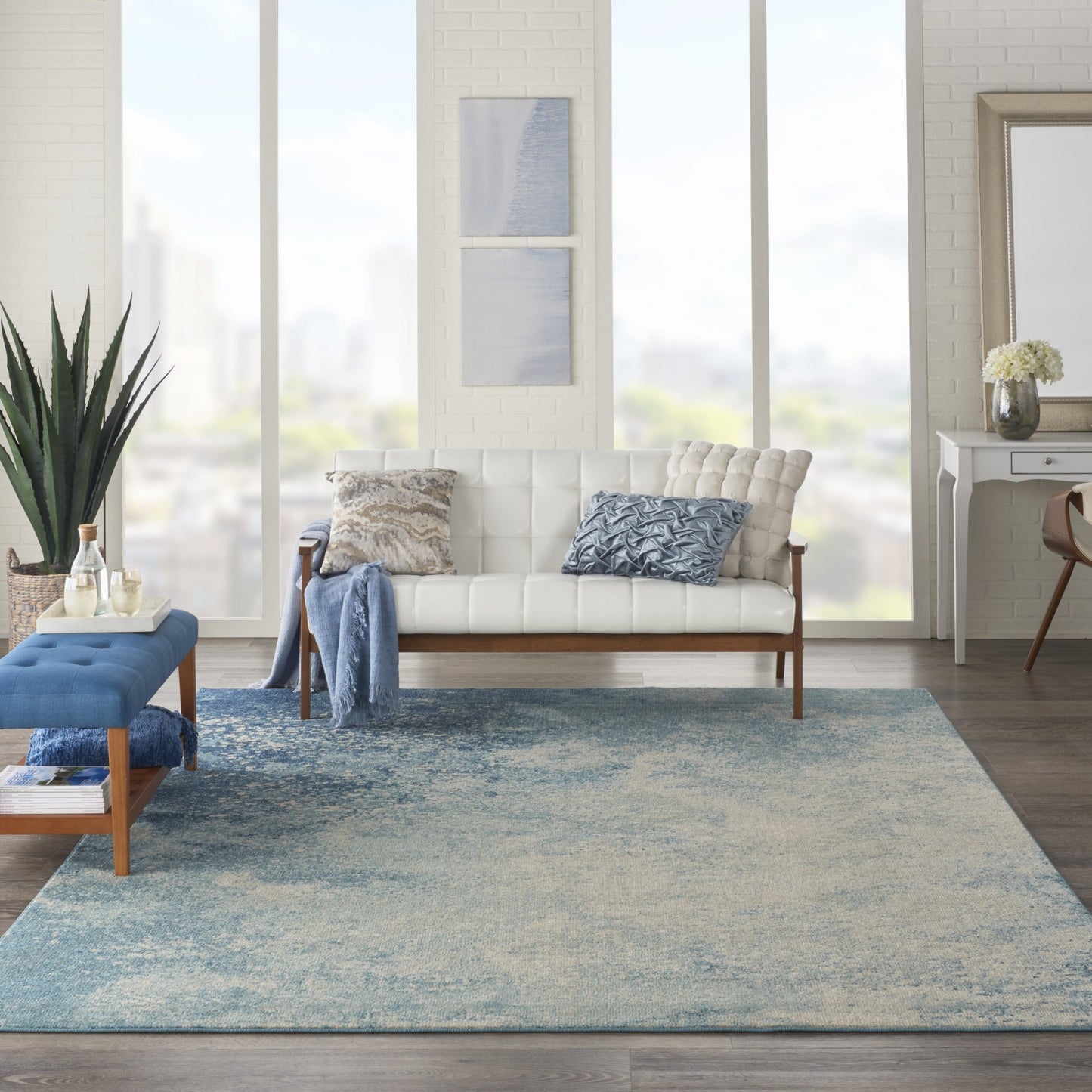 5' X 7' Ivory And Blue Abstract Power Loom Area Rug