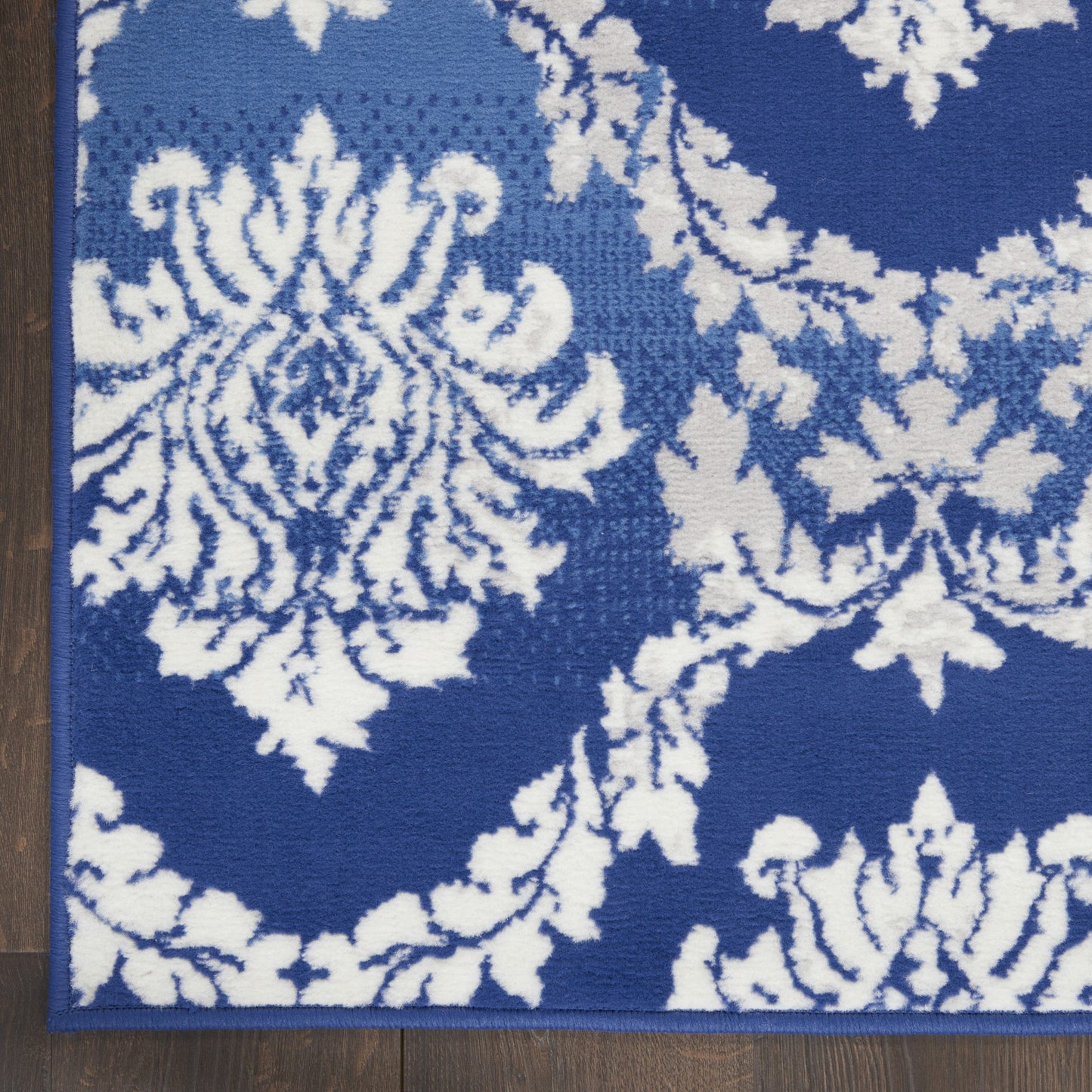 6' X 9' Blue And Ivory Floral Dhurrie Area Rug