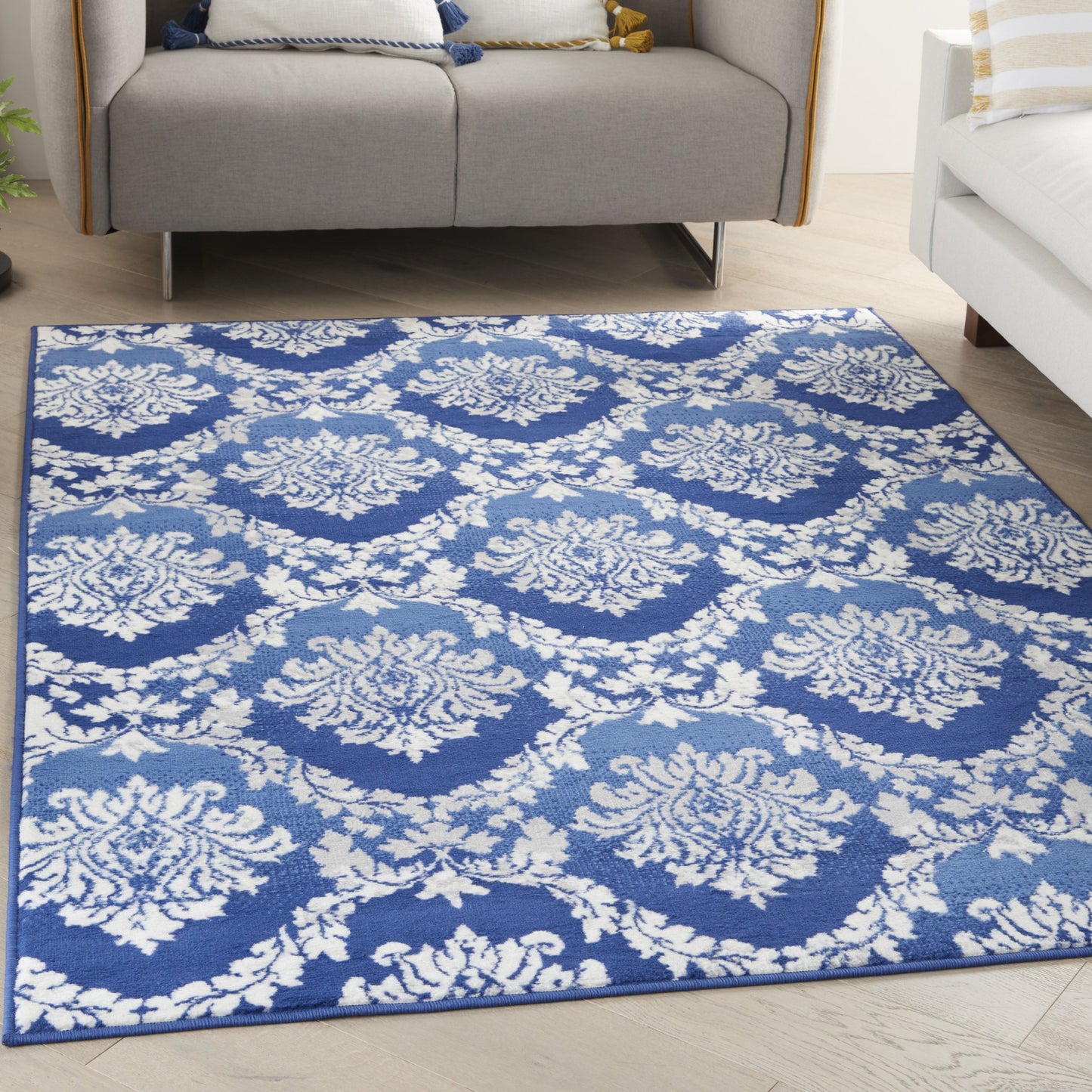 6' X 9' Blue And Ivory Floral Dhurrie Area Rug