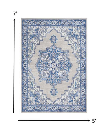 4' X 6' Blue And Ivory Floral Dhurrie Area Rug