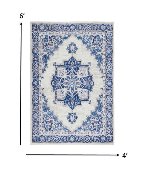 4' X 6' Blue And Ivory Floral Dhurrie Area Rug