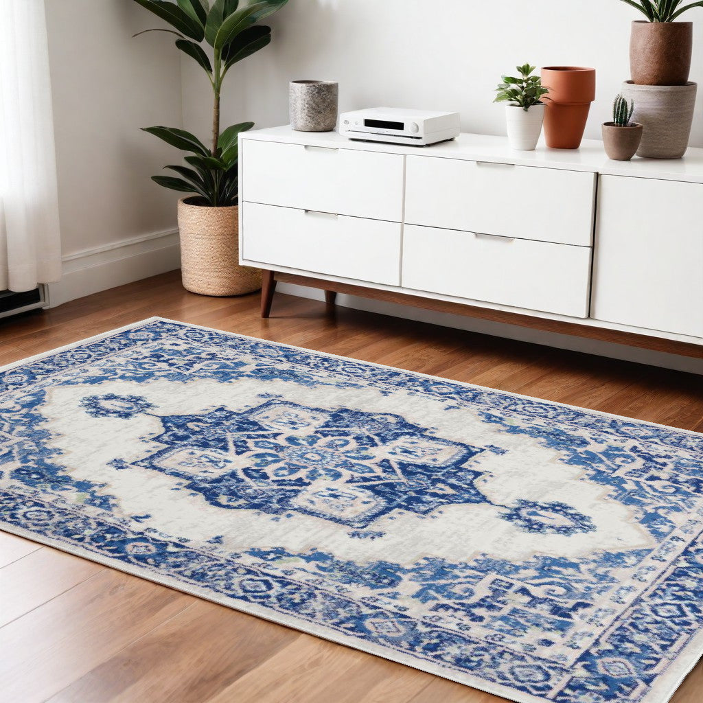 4' X 6' Blue And Ivory Floral Dhurrie Area Rug