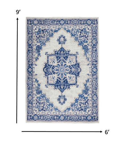 4' X 6' Blue And Ivory Floral Dhurrie Area Rug