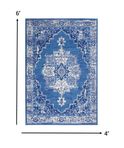 4' X 6' Blue And Ivory Floral Dhurrie Area Rug