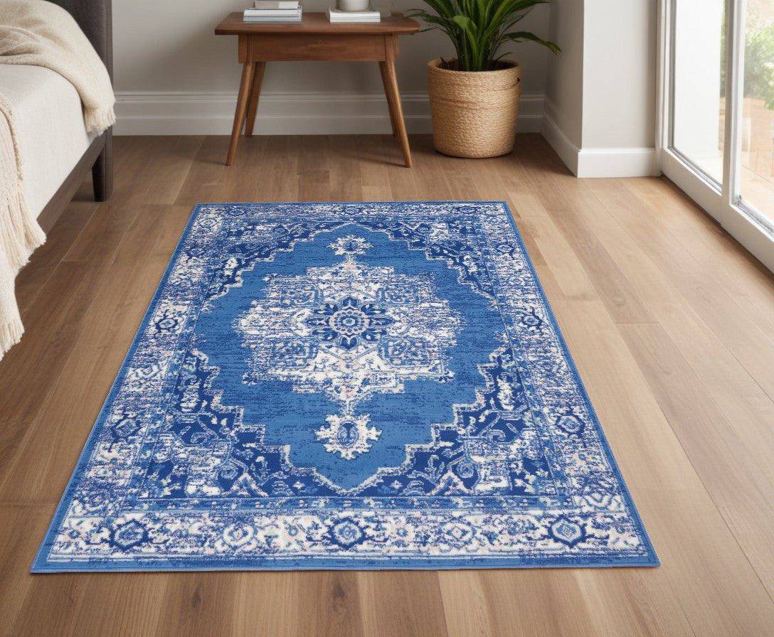 4' X 6' Blue And Ivory Floral Dhurrie Area Rug