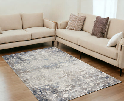 4' X 6' Navy And Beige Distressed Vines Area Rug