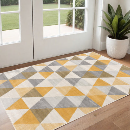 4' X 6' Yellow and Ivory Geometric Area Rug