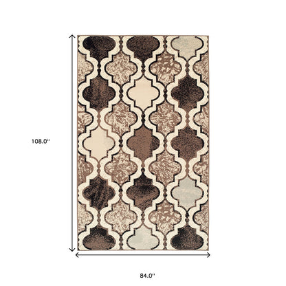 7' X 9' Ivory Quatrefoil Power Loom Distressed Stain Resistant Area Rug