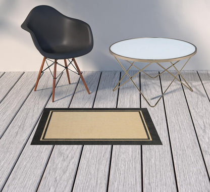 2' x 3' Beige and Black Stain Resistant Indoor Outdoor Area Rug