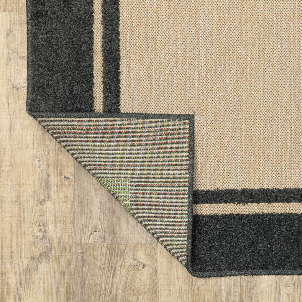 2' x 3' Beige and Black Stain Resistant Indoor Outdoor Area Rug