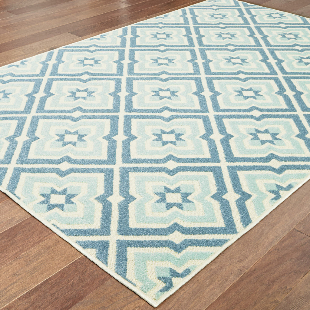 7' x 10' Blue and Ivory Geometric Stain Resistant Indoor Outdoor Area Rug