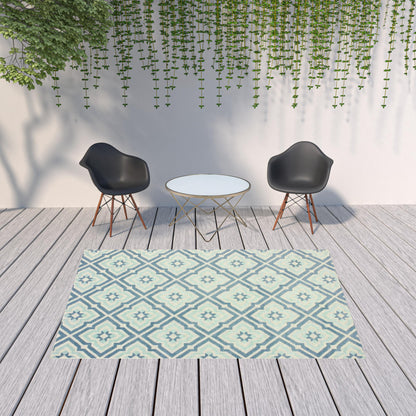 7' x 10' Blue and Ivory Geometric Stain Resistant Indoor Outdoor Area Rug