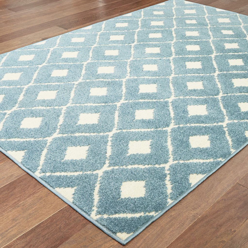 7' x 10' Blue and Ivory Geometric Stain Resistant Indoor Outdoor Area Rug