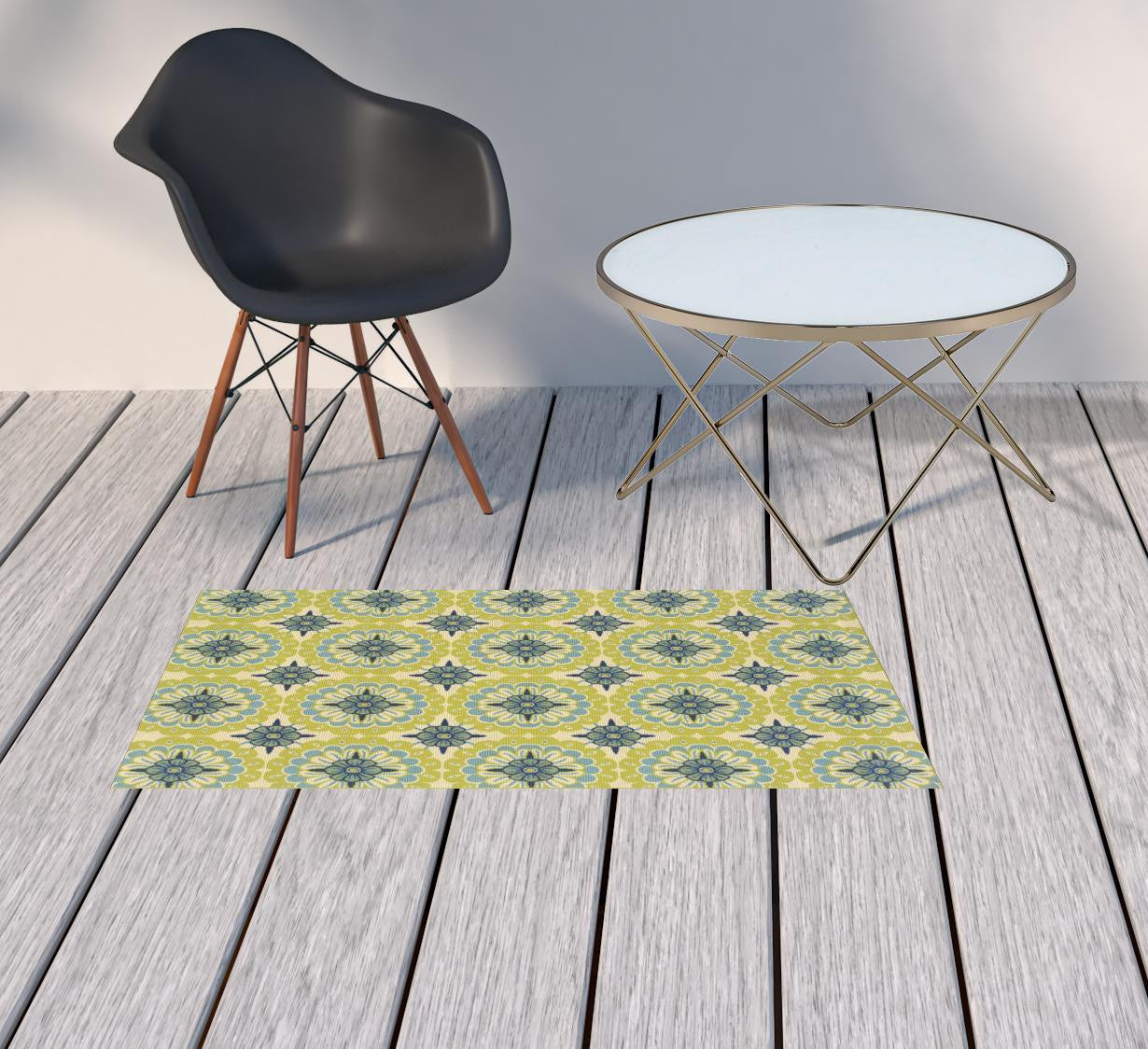 2' X 4' Green and Ivory Floral Stain Resistant Indoor Outdoor Area Rug