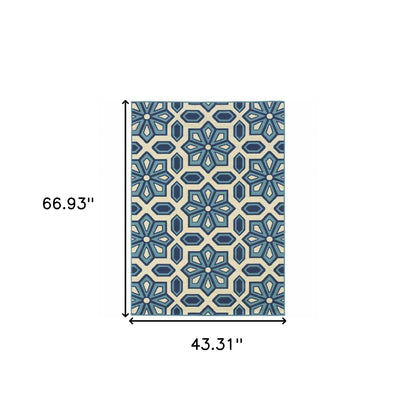 4' x 6' Ivory and Blue Geometric Stain Resistant Indoor Outdoor Area Rug