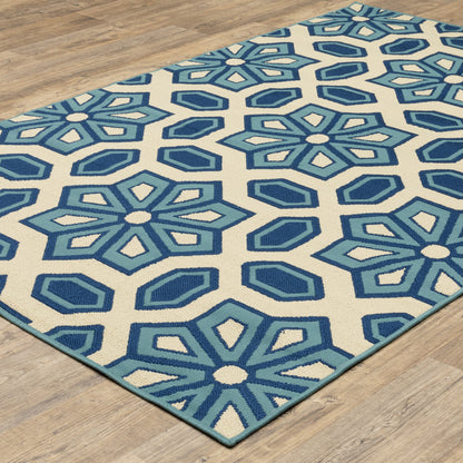 4' x 6' Ivory and Blue Geometric Stain Resistant Indoor Outdoor Area Rug