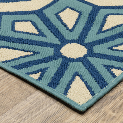 5' x 8' Ivory and Blue Geometric Stain Resistant Indoor Outdoor Area Rug