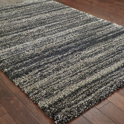 5' X 8' Charcoal Silver And Grey Geometric Shag Power Loom Stain Resistant Area Rug