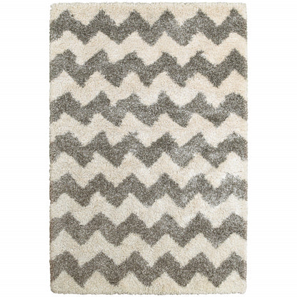 4' X 6' Grey And Ivory Geometric Shag Power Loom Stain Resistant Area Rug