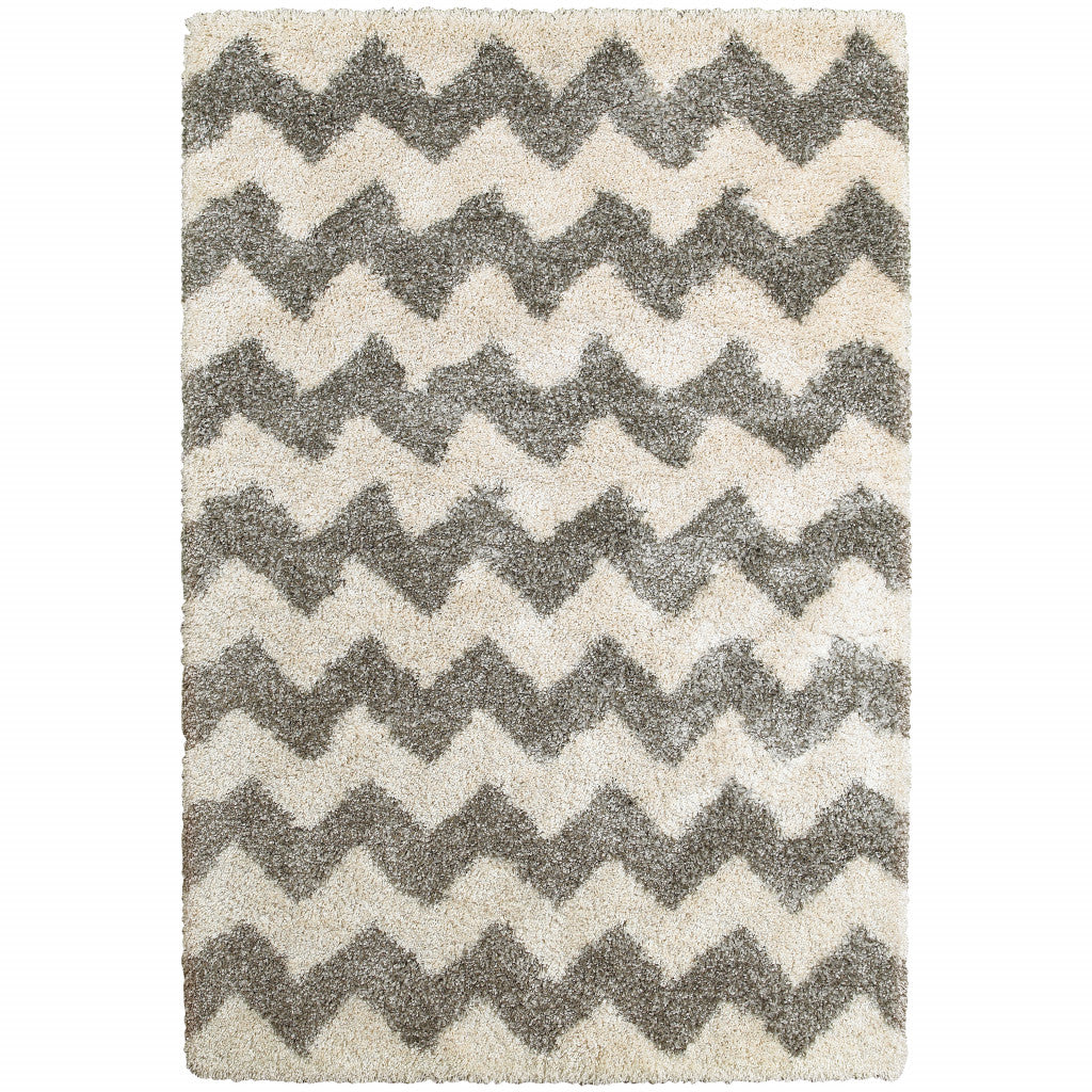 10' X 13' Grey And Ivory Geometric Shag Power Loom Stain Resistant Area Rug