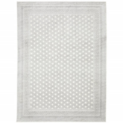 6' X 9' White And Grey Oriental Power Loom Stain Resistant Area Rug