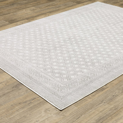 6' X 9' White And Grey Oriental Power Loom Stain Resistant Area Rug