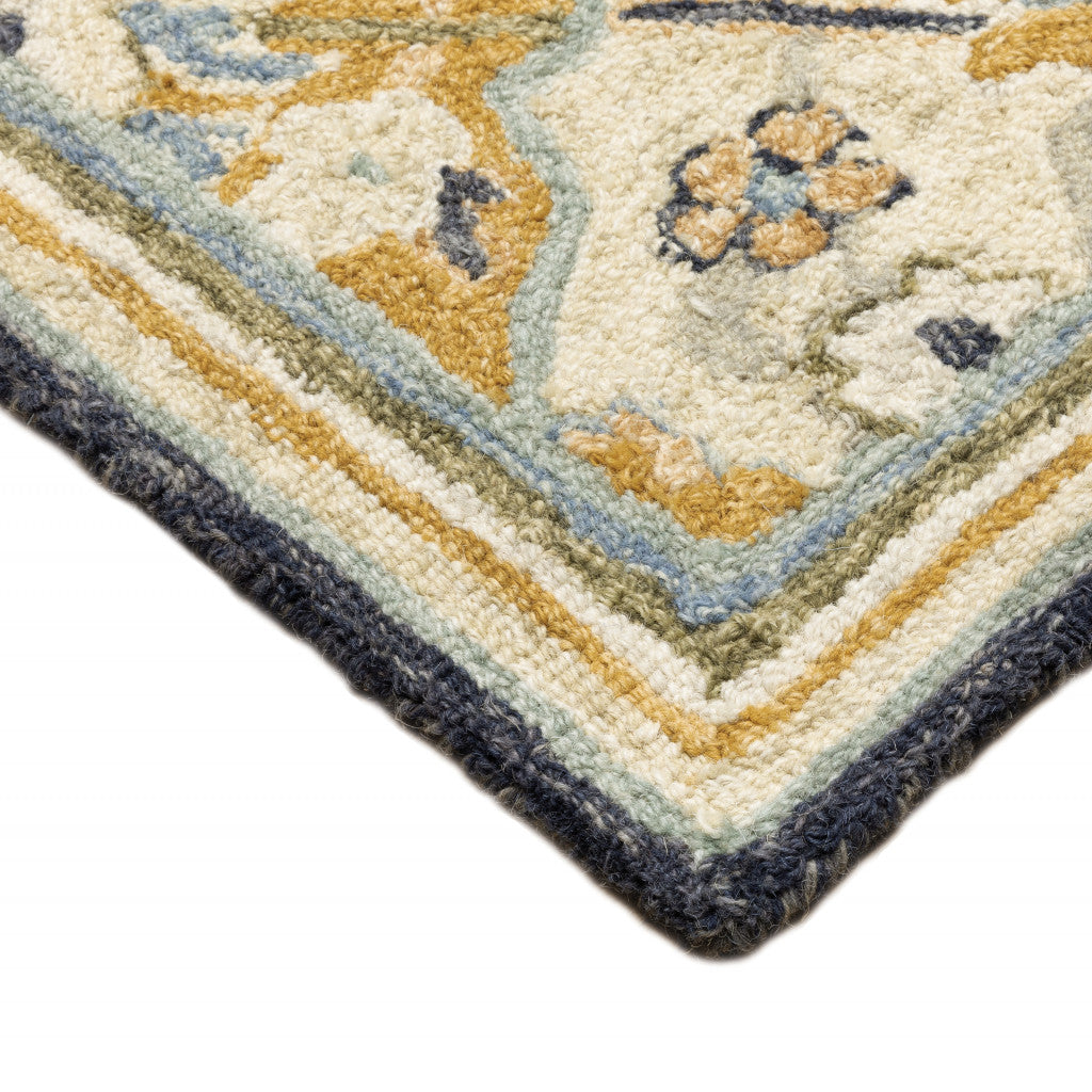 10' X 13' Blue Green Gold Navy And Ivory Geometric Tufted Handmade Stain Resistant Area Rug