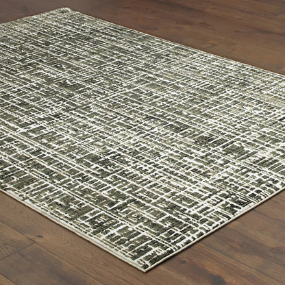 10' X 13' Grey And Ivory Abstract Power Loom Stain Resistant Area Rug