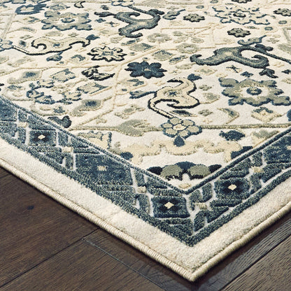 10' X 13' Ivory Navy And Gold Oriental Power Loom Stain Resistant Area Rug