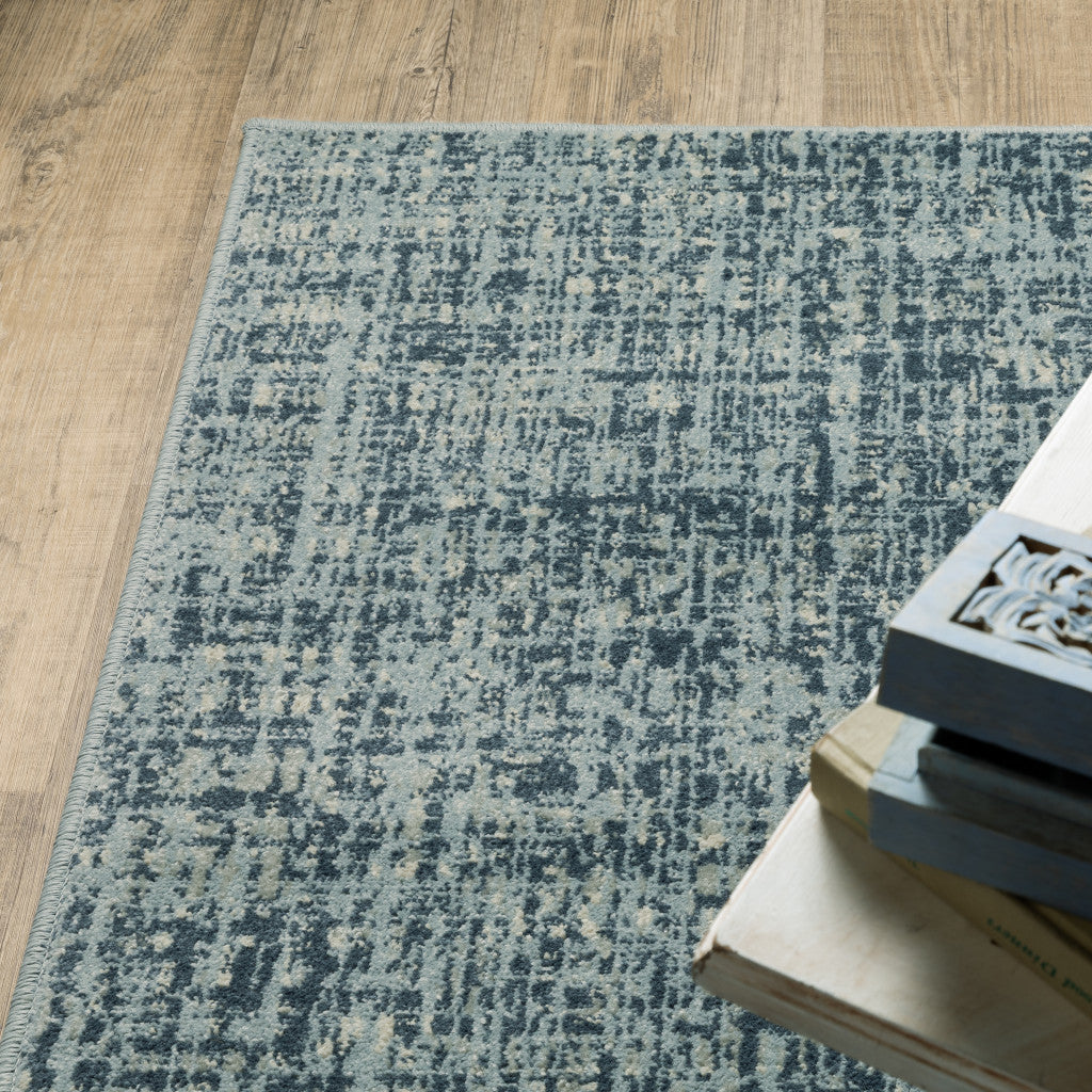 10' X 13' Dark Blue Light Blue Grey Ivory And Beige Abstract Power Loom Stain Resistant Area Rug