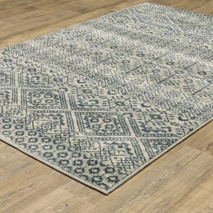 10' X 13' Blue And Beige Geometric Power Loom Stain Resistant Area Rug