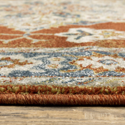 10' X 13' Rust Beige Teal Blue And Gold Oriental Power Loom Stain Resistant Area Rug