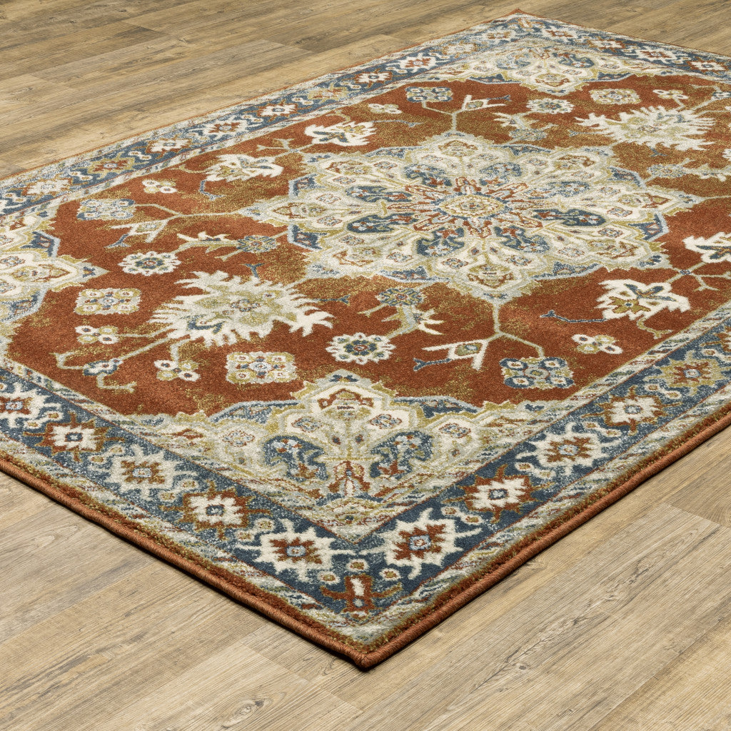 10' X 13' Rust Beige Teal Blue And Gold Oriental Power Loom Stain Resistant Area Rug