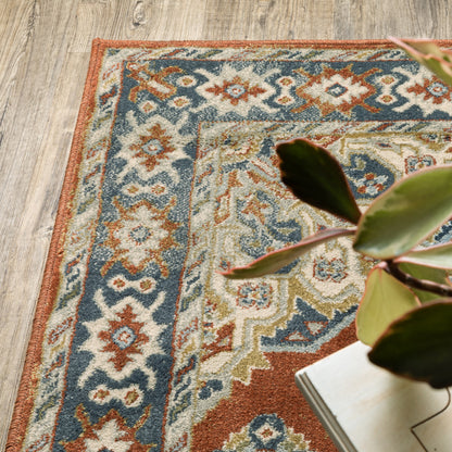 10' X 13' Rust Beige Teal Blue And Gold Oriental Power Loom Stain Resistant Area Rug