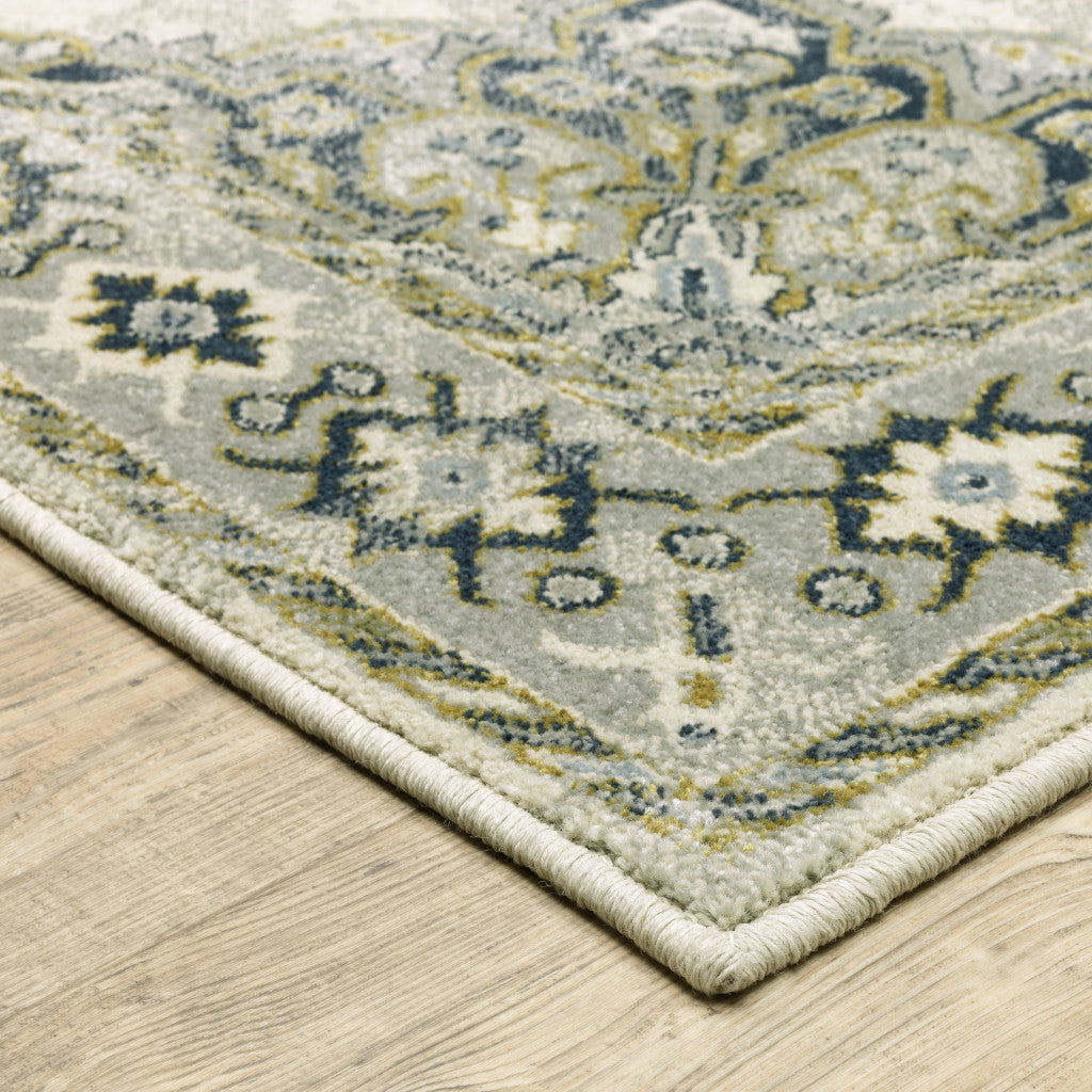 10' X 13' Ivory Blue Teal Grey And Olive Green Oriental Power Loom Stain Resistant Area Rug