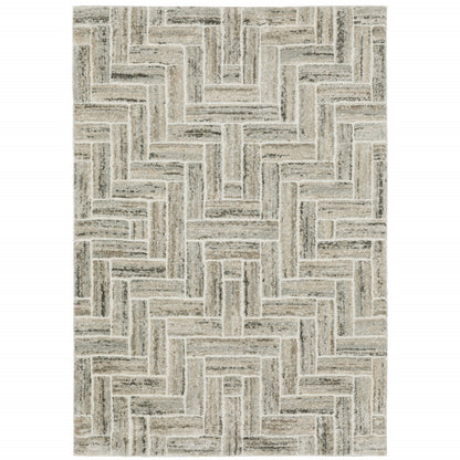 10' X 13' Ivory Beige Grey Brown Pale Blue And Charcoal Geometric Power Loom Stain Resistant Area Rug