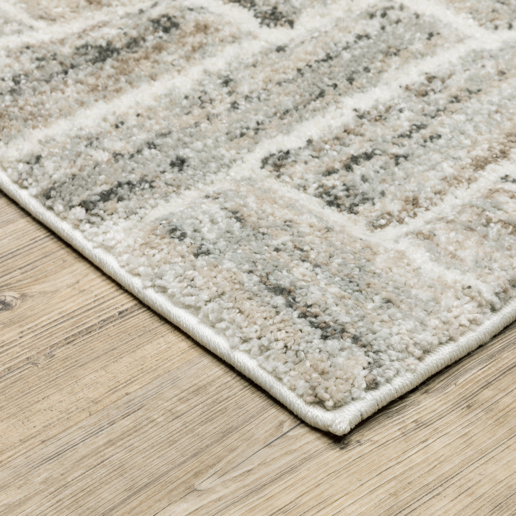 10' X 13' Ivory Beige Grey Brown Pale Blue And Charcoal Geometric Power Loom Stain Resistant Area Rug