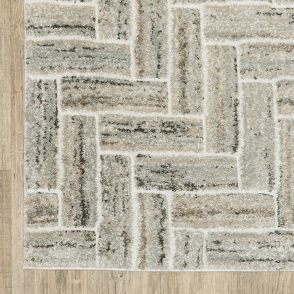 10' X 13' Ivory Beige Grey Brown Pale Blue And Charcoal Geometric Power Loom Stain Resistant Area Rug