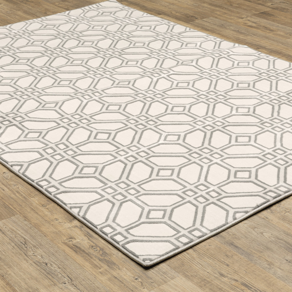 10' X 13' Ivory And Grey Geometric Power Loom Stain Resistant Area Rug