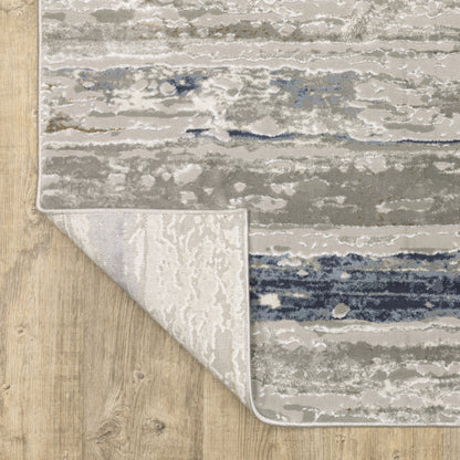 10' X 13' Blue Ivory Grey Light Blue And Brown Abstract Power Loom Stain Resistant Area Rug