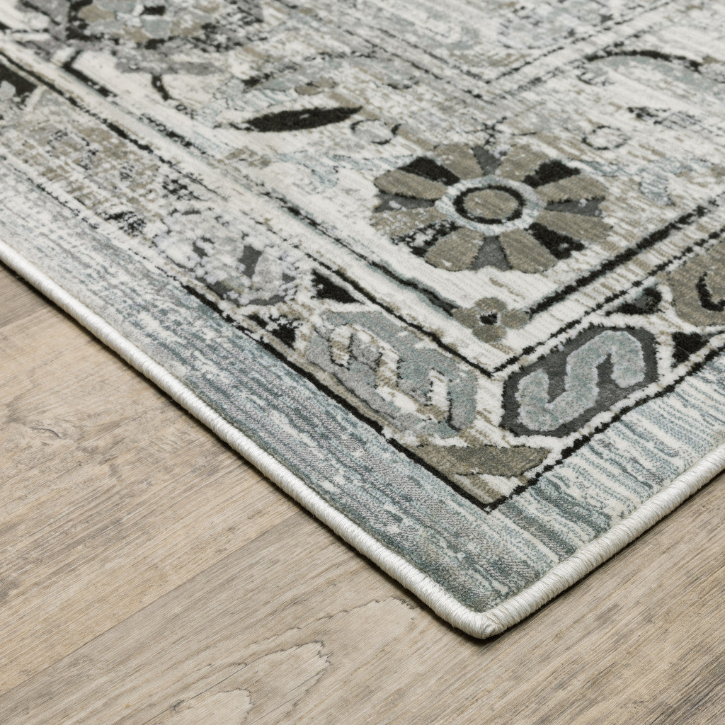 10' X 13' Ivory Grey Charcoal Blue And Taupe Oriental Power Loom Stain Resistant Area Rug